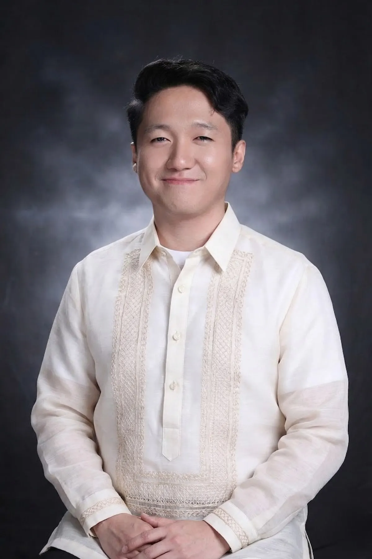 Portrait of Eldridge Jhames Velmonte wearing a barong